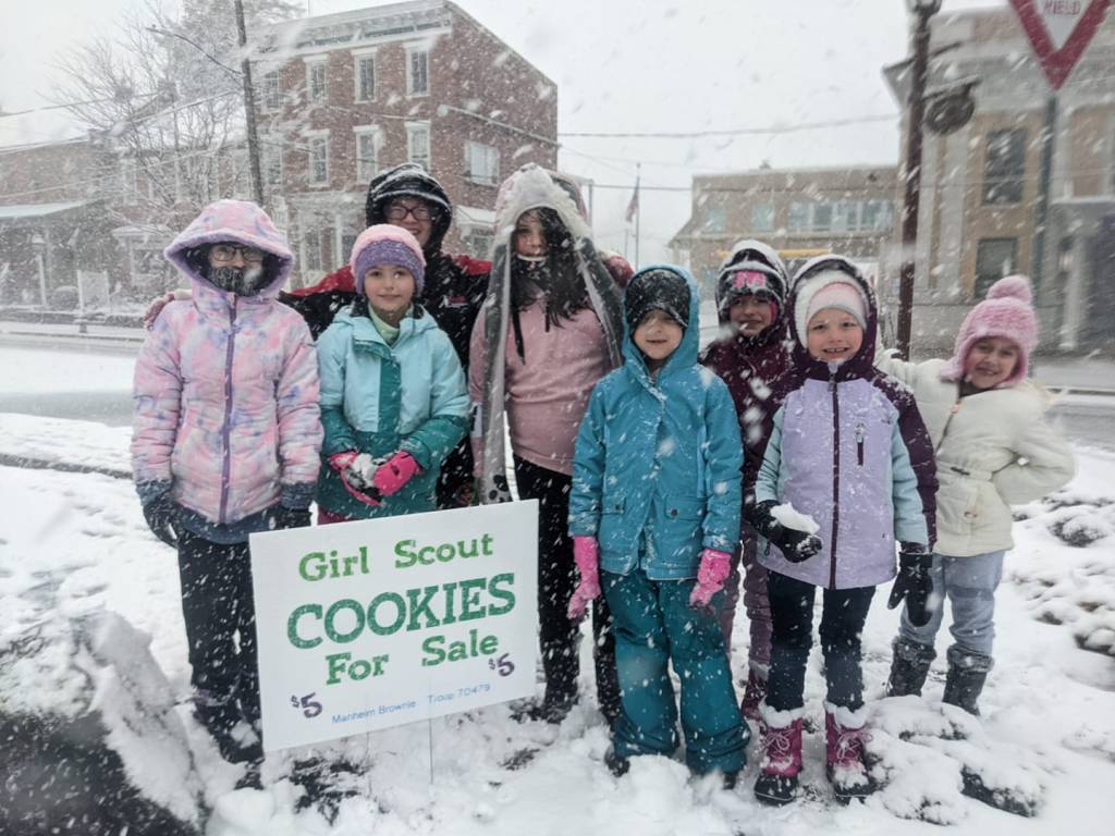 Girl Scouts at Girl Scout Cookie Booth